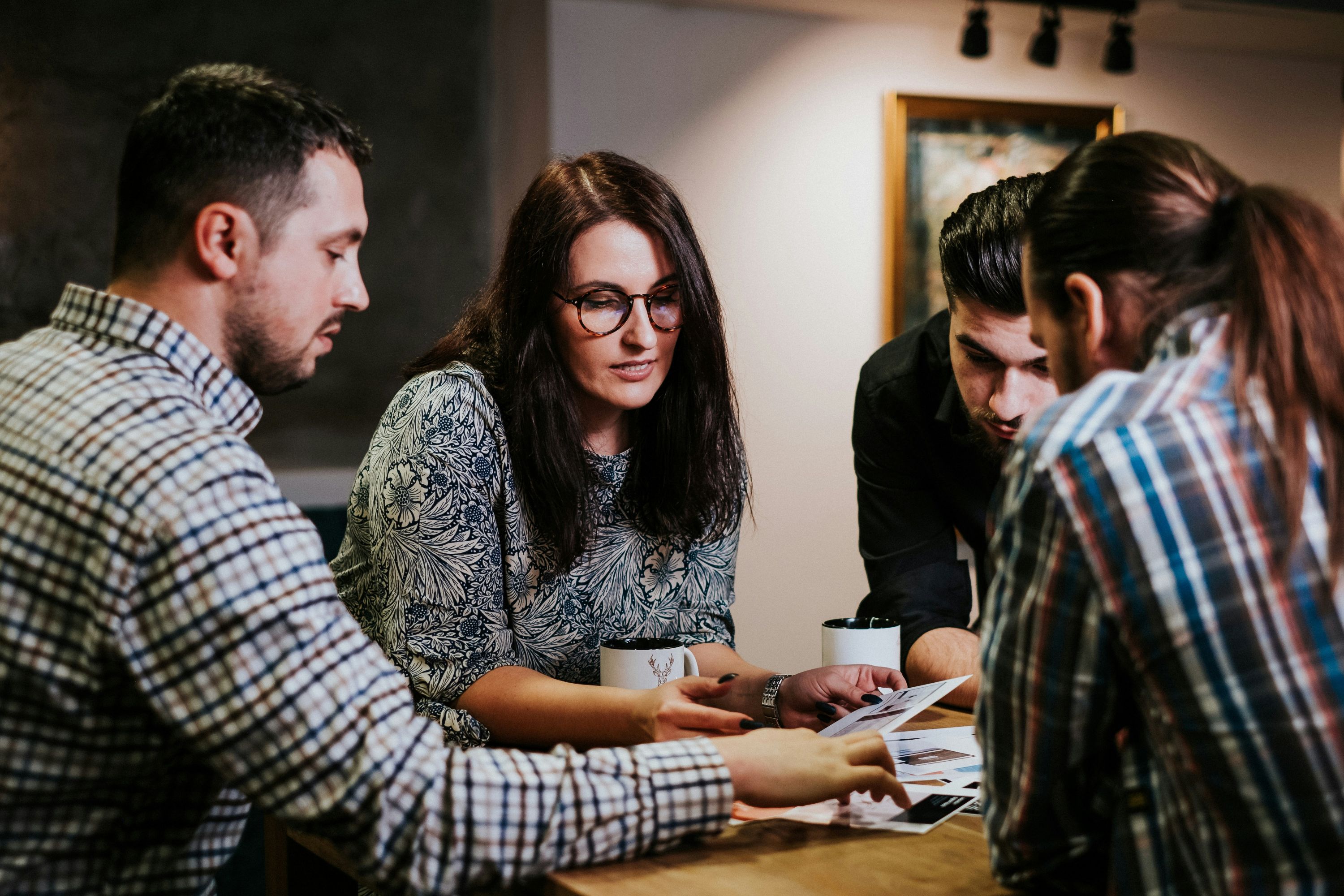 Collaborative team meeting in modern office workspace